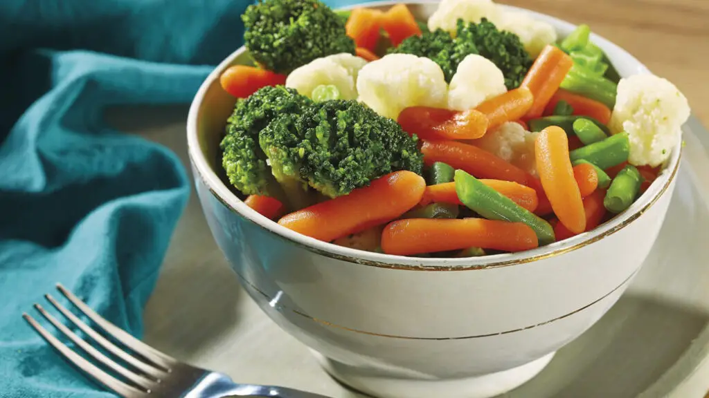 a bowl full of fresh vegetables